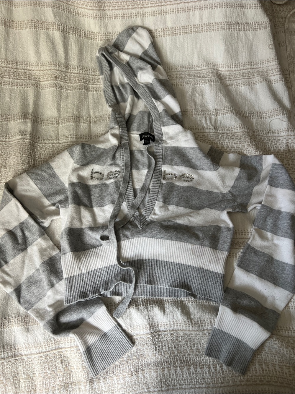 BEBE Striped Gray & White Cropped Hoodie with Embellished Logo